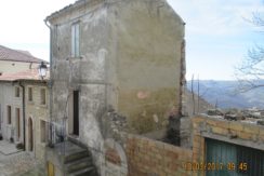 three stone houses